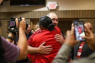 Staff photo by Olivia Ross / UAW President Shawn Fain hugs union supporters after the union's win at Volkswagen Chattanooga on April 19. The National Labor Relations Board has certified the election results.